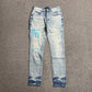 AMIRI VARSITY LOGO JEANS