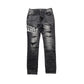AMIRI VARSITY LOGO REPAIR JEANS