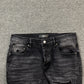 AMIRI VARSITY LOGO REPAIR JEANS