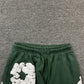 DENIM TEARS COTTON WREATH SWEATPANTS GREEN