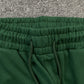 DENIM TEARS COTTON WREATH SWEATPANTS DARK GREEN