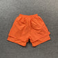 SP5DER OG WEB DOUBLE LAYER SHORT ORANGE