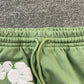 DENIM TEARS COTTON WREATH SWEATPANTS LIGHT GREEN